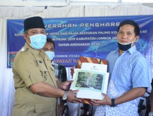 Plt Bupati Lombok Utara Hadiri Penyerahan Hadiah Wajib Pajak Kooperatif